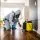 Pest control professional performing preventive pest control treatment